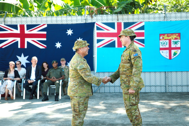 Lieutenant Colonel Marek Janiszewski (right) hands over command of Operation Lilia to Lieutenant Colonel Glenn Mackenzie during a transfer of authority parade held in Guadalcanal, Solomon Islands. Operation Lilia is the ADF's contribution to the Solomons' International Assistance Force (SIAF). (Defence)