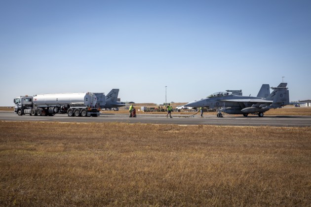 Two Royal Australian Air Force F/A-18F Super Hornet aircraft receive fuel at RAAF Base Darwin during Exercise Talisman Sabre 23.

Credit: Defence