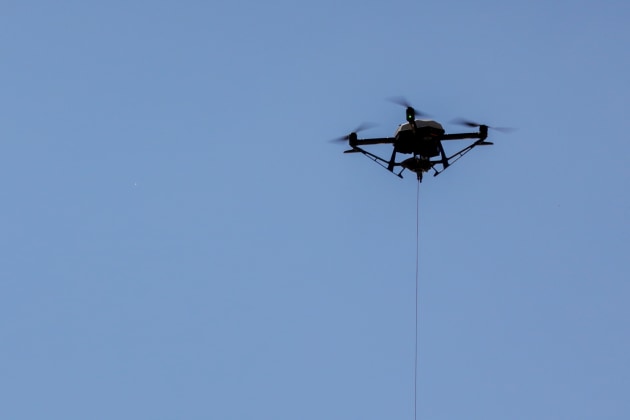 The United States tethered Hoverfly drone in operation.

Credit: Defence