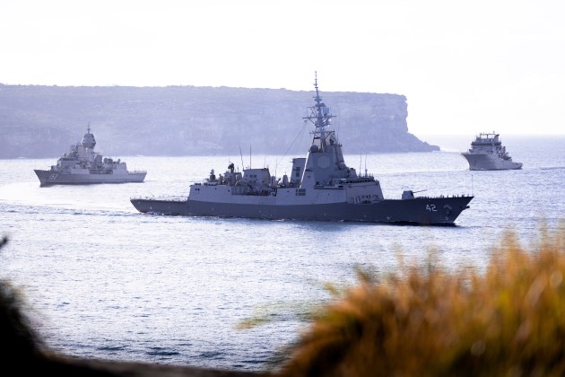 (L-R) HMAS Warramunga, HMAS Sydney and HMNZS Manawanui conduct a formation entry into Sydney Harbour, NSW. Note the Naval Strike Missile canister on HMAS Sydney. 

Credit: Defence