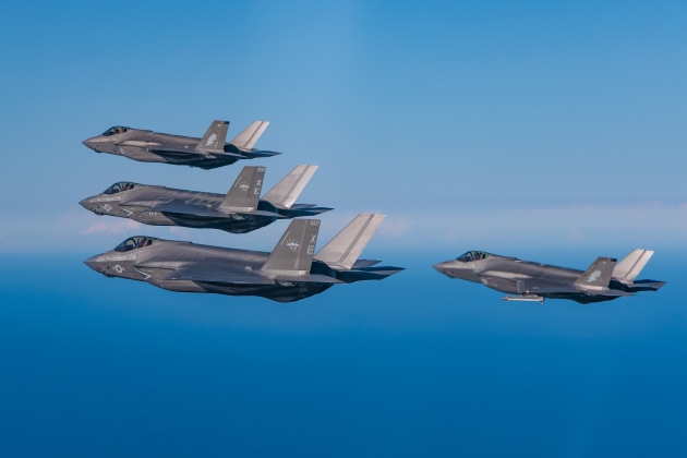 Australian F-35As fly alongside F-35Cs of VX-9. 

Credit: Defence