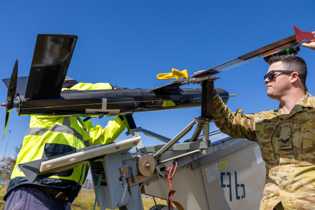 Army and Innovaero personnel load an OWL-B loitering munition onto a launcher as part of the Land Autonomous Systems & Teaming&ndash;Demonstration at Puckapunyal Military Area, September 2024.

Credit: Defence