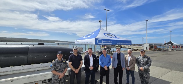 (L-R): Commodore Michael Turner, RAN, Director General Maritime Integrated Capabilities branch; Michael Parker, C2 Robotics; Gavin Henry, Thales Australia Underwater Systems; Jarrod O&rsquo;Kane, C2 Robotics; Tim Cain, Thales Australia Underwater Systems; Adam Waldie, Thales Australia Underwater Systems; Captain Andrew Stevens, RAN, Director Maritime Uncrewed Warfare. 

Credit: Thales Australia