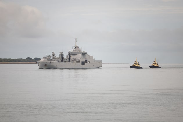 French Navy Ship Jacques Chevallier is escorted by harbour tug boats in the Port of Darwin, NT.

Credit: Defence