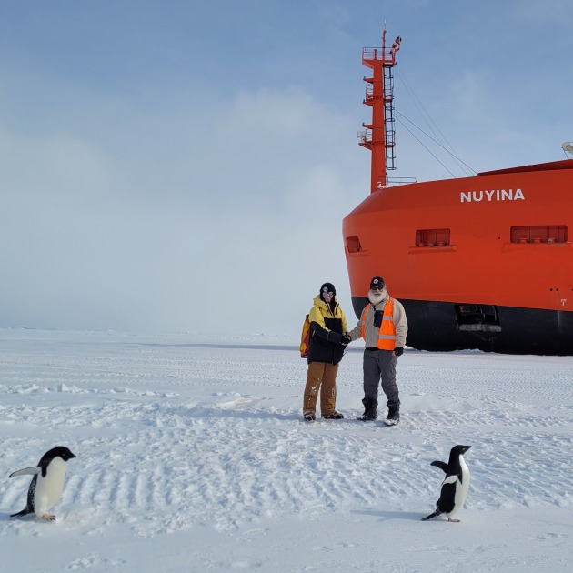 SQNLDR Rengel receiving handover from the 77th ANARE Medical Practitioner Dr Peter Rizzo in front of the RSV Nuyina, joined by some local Adelie penguins.

Credit: Defence