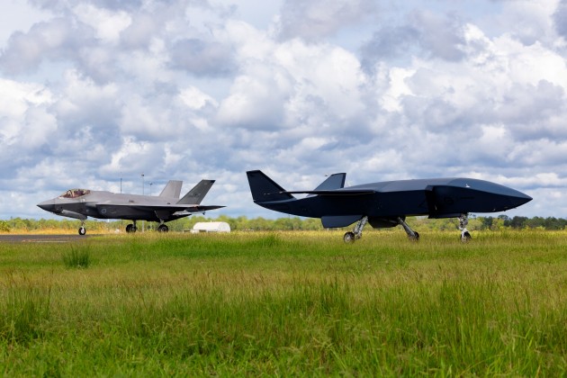 A MQ-28A Ghost Bat on the tarmac as an F-35A Lightning II taxis after a sortie during Exercise Carlsbad at RAAF Base Tindal.

Credit: Defence