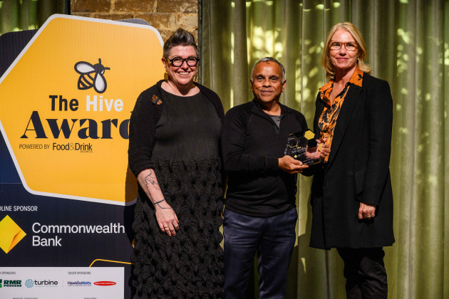 Chobani Australia's packaging innovation manager Kailash Bajpaj accepts the award Kim Berry, editor and Lindy Hughson publisher of Food & Drink Business.