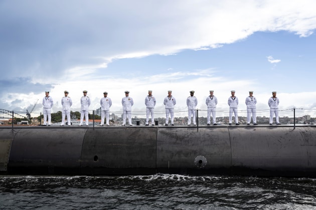 Personnel from Royal Australian Navy Collins Class Submarine HMAS Dechaineux line the casing during the Kakadu Fleet Review in Sydney, New South Wales.

Credit: LSIS Lucinda Allanson / Defence
