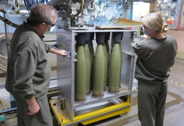 Thales Australia employees fill M795 155mm high-explosive projectiles at the Benalla Munitions Manufacturing Plant in Victoria, Australia. 

Credit: Thales Australia