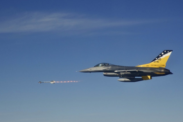 An Air Force F-16 Fighting Falcon fires an AIM-9M Sidewinder missile. (US DOD)
