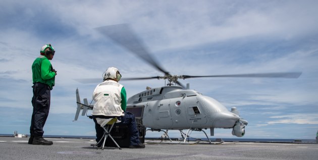 Aviation Electronics Technician 1st Class Corie Wooldridge, from San
Marcos, California, performs ground turns on an MQ-8C Fire Scout, attached to the Wildcards of Helicopter Sea Combat (HSC) Squadron 23, assigned to the Independence-variant littoral combat ship USS Jackson (LCS 6). (US Navy)