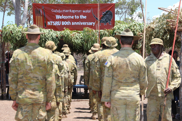 Personnel from Arnhem Squadron, NORFORCE parade at Raymangirr in East Arnhem Land, to commemorate the 80th anniversary of the makarrata and the forming of the NTSRU in 1942. (Defence)