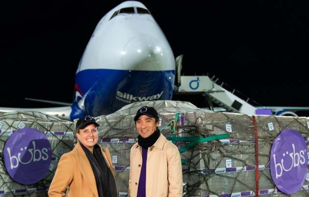 Bubs Australia CEO and Founder Kristy Carr, and Chairman Dennis Lin with the first load of Operation Fly Formula.
