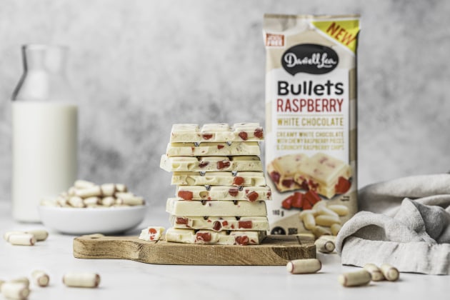 Darrell Lea's first white chocolate block features raspberry bullets and candies.