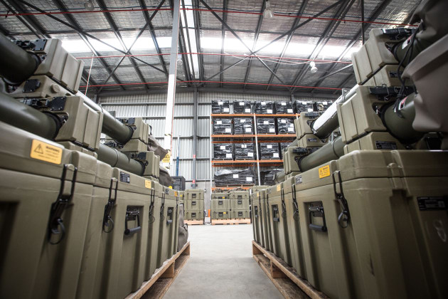 The NAM transit cases and other Project Currawong equipment await delivery in a Boeing warehouse. Credit: BDA