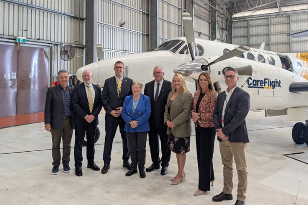 Dignitaries in front of a CareFlight KIng Air at Newcastle include Newcastle Airport Director Neil Hart AM, CareFlight CEO, Mick Frewen, Newcastle Airport Interim CEO Andrew Warrender, Newcastle Airport Chair Jude Munro AO, CareFlight Chair Brad Hazzard, Newcastle Airport Director Nuatali Nelmes, Newcastle Airport Deputy Chair Samantha Martin-Williams, Newcastle Airport Executive GM Planning & Infrastructure Ben Kochanski.