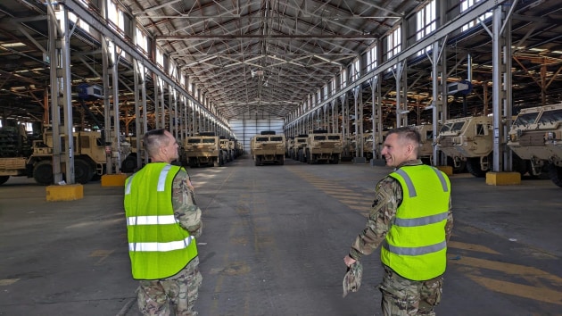 Maj. Gen. Jered Helwig, the commanding general of the 8th Theater Sustainment Command receives a tour of the Joint Theater Distribution Center from Capt. Shaun Ketner, officer in charge for download operations, 130th Engineer Brigade in Bandiana, Australia May 22, 2024. 

Credit: 8th TSC