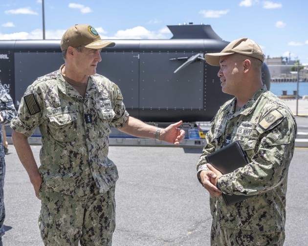 Vice Admiral Blake Converse, deputy commander, U.S. Pacific Fleet, tours an unmanned undersea vehicle static display during Exercise Rim of the Pacific 2024 on Joint Base Pearl Harbor-Hickam July 18, 2024. 

Credit: US Navy/Mass Communication Specialist 1st Class Scott Barne