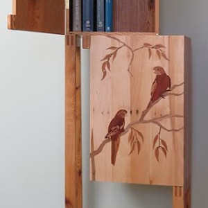 Cabinet by Alex Springall. The doors feature marquetry renderings of crimson rosellas and a sulphur crested cockatoo.