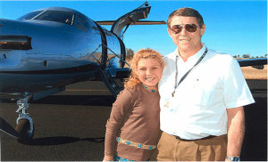 Angel Flight founder Bill Bristow with a very valuable charge. (Angel Flight)