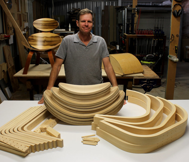 Darren Oates with his Apollonius chairs