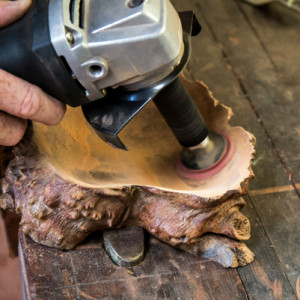 This new tool is an angle grinder attachment with a random orbital action.