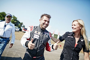 Hannes Arch is all smiles after winning the third round of the 2015 Red Bull Air Race in Rovinj, Croatia. (Balazs Gardi/Red Bull Content Pool)