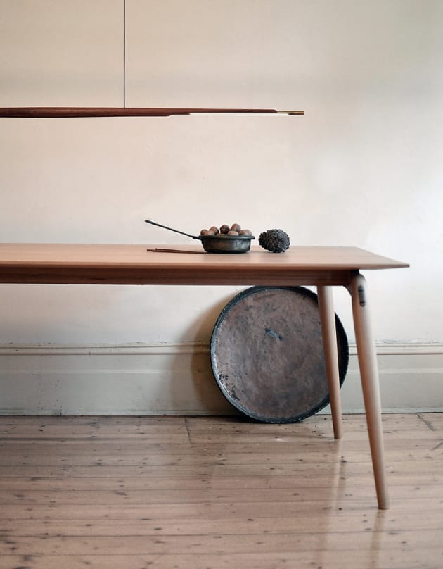 ADAM MARKOWITZ | VIC 
The Assegai Pendant blends sleek lines with subtly sculpted timber to create a contemporary LED pendant. The brass adds elegance and warmth, as well as diffusing the heat.