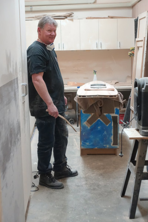 A student with board in progress at Bodhi Tree Surf.