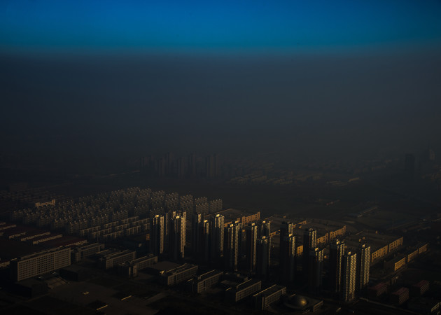 Contemporary Issues, 1st prize singles. &copy; Zhang Lei, China, 2015, Tianjin Daily, Haze in China. A city in northern China shrouded in haze, Tianjin, China, 10 December 2015.