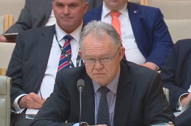 Shane Carmody fronts the Senate Estimates Committee yesterday. (still from parliament house feed)