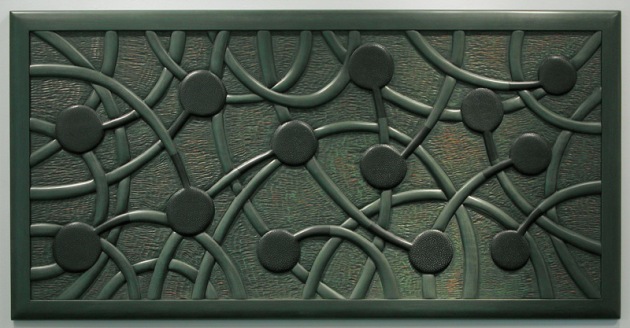 Carved headboard by Andy Buck.