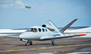 SF50 certification aircraft "C-zero" waits for take-off. (Cirrus)