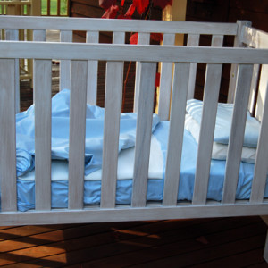 Livos finish on a child's cot
