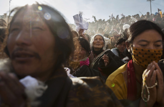 Daily Life, 2nd prize stories. &copy; Kevin Frayer, Canada, 2015, Getty Images. Tibetan Buddhist nomads listen during the annual Bliss Dharma Assembly in
Sertar county, Garze Tibetan Autonomous Prefecture, Sichuan province, China, 31 October 2015.