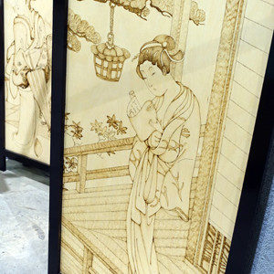 Screen with pyrography by Neville Pike and Alyssa Willstrop.