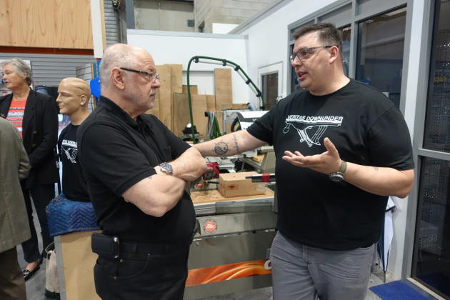 Terry Martin (left), wood artist, curator and author swaps notes on things that happen in Canada with Vic Tesolin.