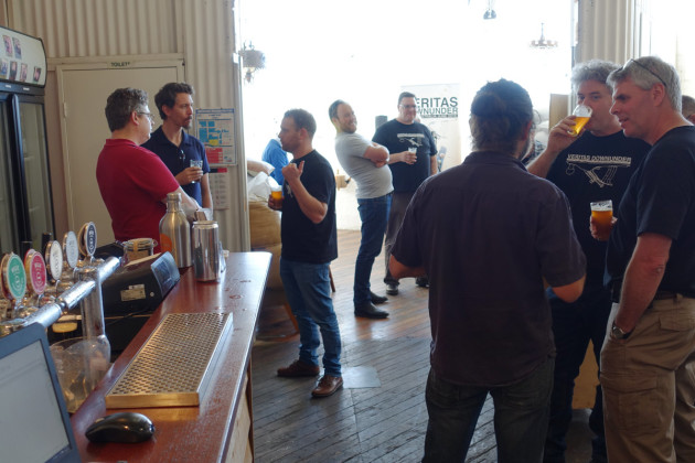Chilling out with a beer in between presentation sessions.
