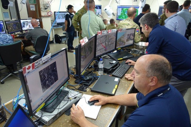 CUE Adelaide 17 personnel monitor the various sensors used during the exercise. Credit: ADM Nigel Pittaway