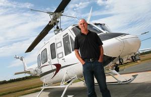 Eagle Copters Australasia Managing Director Grant Boyter with one of the
company&rsquo;s Eagle Single aircraft. (Eagle Copters Australasia)