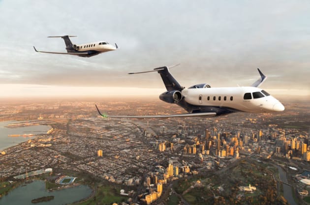 Embraer's Phenom 300 (left) and Legacy 450 (right) executive jets. (Embraer Executive Jets)