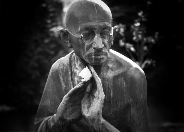 Gandhi & The Rose. May Day, Moscow, Russia 2015. I found Mahatma Gandhi in bronze near Gorki Park. I always wonder how those icons so focused on peace, civil rights and freedom... who have passed, would choose to hold the rose.