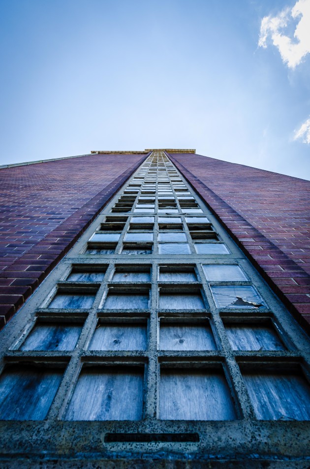 Glass bricks. Boarded up glass brick wondow ascending to the top of the boilerhouse. Fair chance there's a good view from the top. &copy; Brett Patman