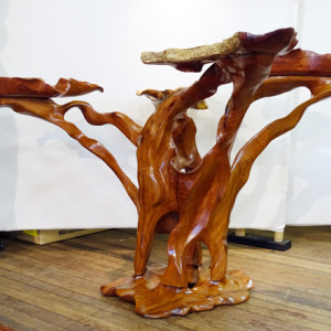 Guy Breay, A Planter's Reflections, carved from five salvaged tree stumps from the artist's property.