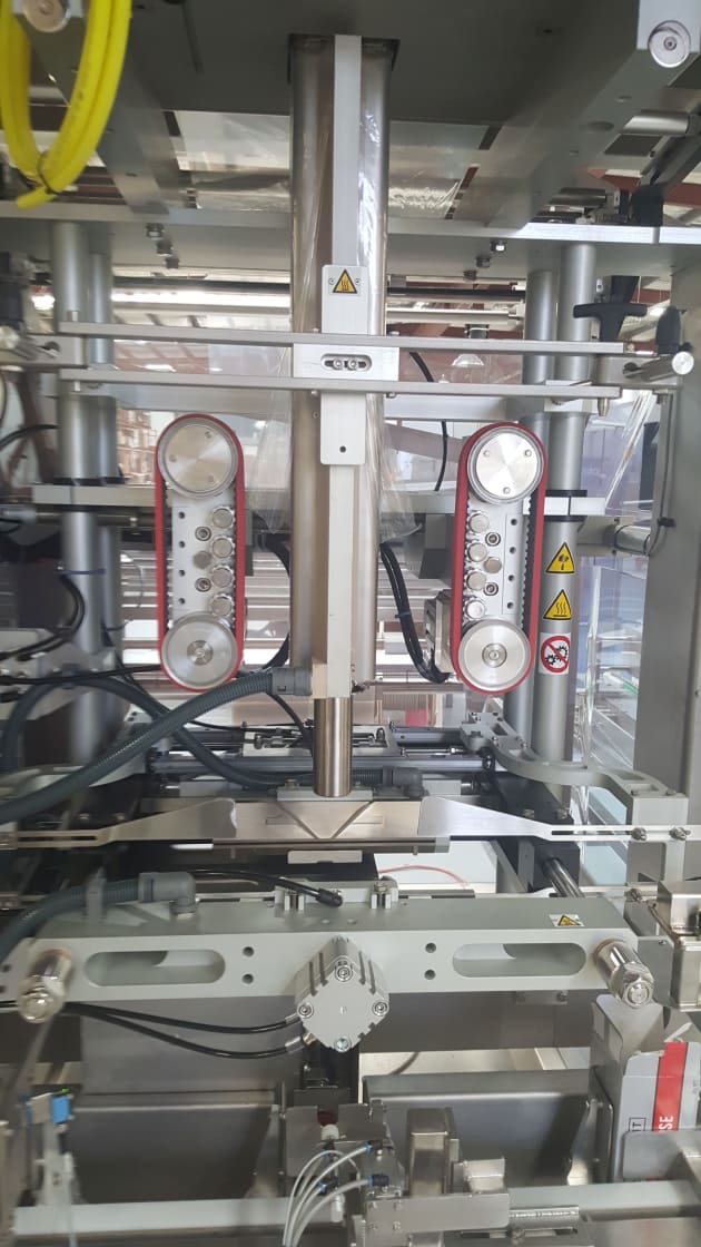 Integrated VFFS with direct bag fill into carton.