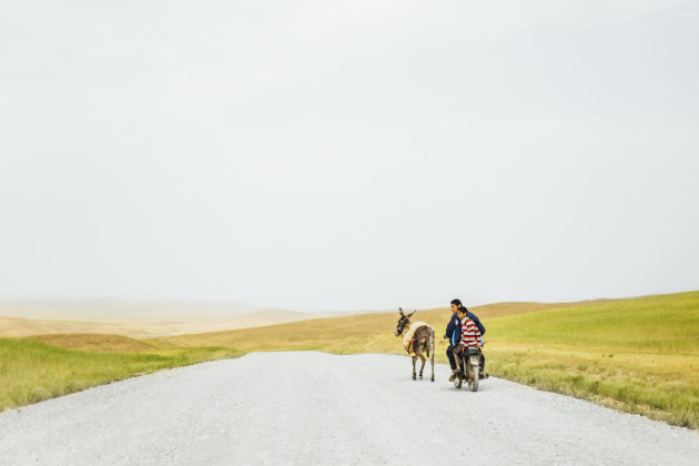 Brothers on a motorcycle, West Azerbaijan, Northern Iran, 2015, from the series, Iran: A new future. &copy; Kern Hendricks.