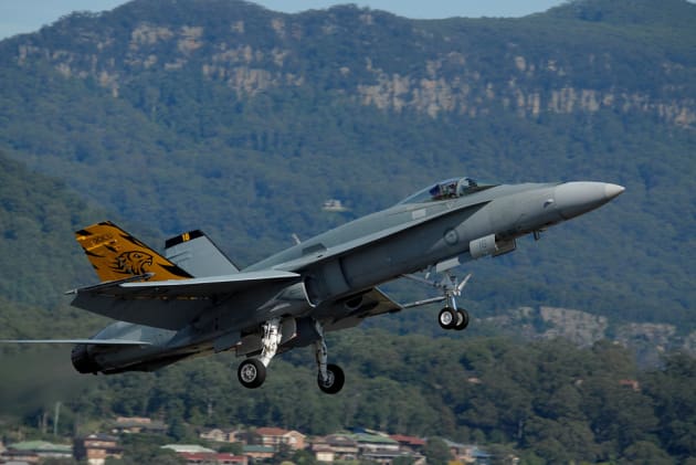 A 2 OCU F/A-18 Hornet powers up for a go-around. It was one of two Hornets that the RAAF brought to WOI. (Steve Hitchen)