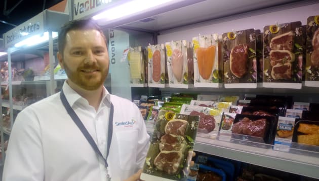 Paul McGuire is the marketing manager for Cryovac Darfresh on Board: a packaging innovation from Sealed Air Food Care that offers more space for communicating a brand's story, as well as environmental benefits. 
The recyclable, moisture-resistant board is a "blank canvas" for communications, according to McGuire. 
Vacuum skin barrier film technology reduces waste throughout the supply chain by delivering extended shelf life; and 100% film utilisation means zero scrap or landfill.
The packaging solution is close to being launched commercially in ANZ. Visy is Sealed Air's board partner and Mondini is its equipment partner.
