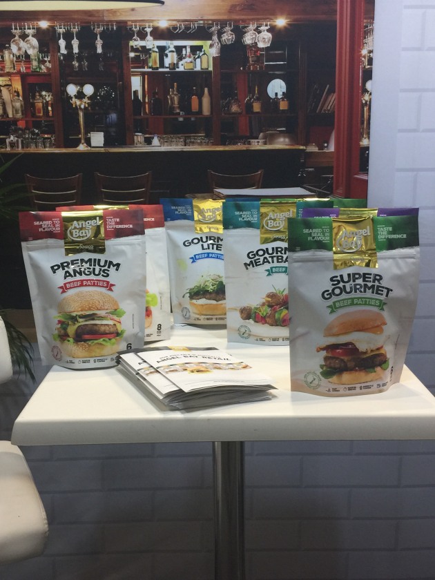 Angel Bay's new frozen par-cooked beef patties in stand-up packs for retail.