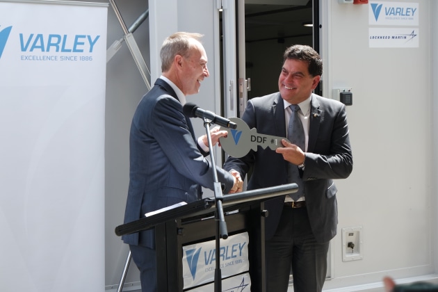 Lockheed Martin Australia CEO Vince Di Pietro (R) with Jeff Phillips, MD Varley Group, mark the official handover of the first two F-35 deployable facilities manufactured by Varley Group. Credit: Lockheed Martin Australia
